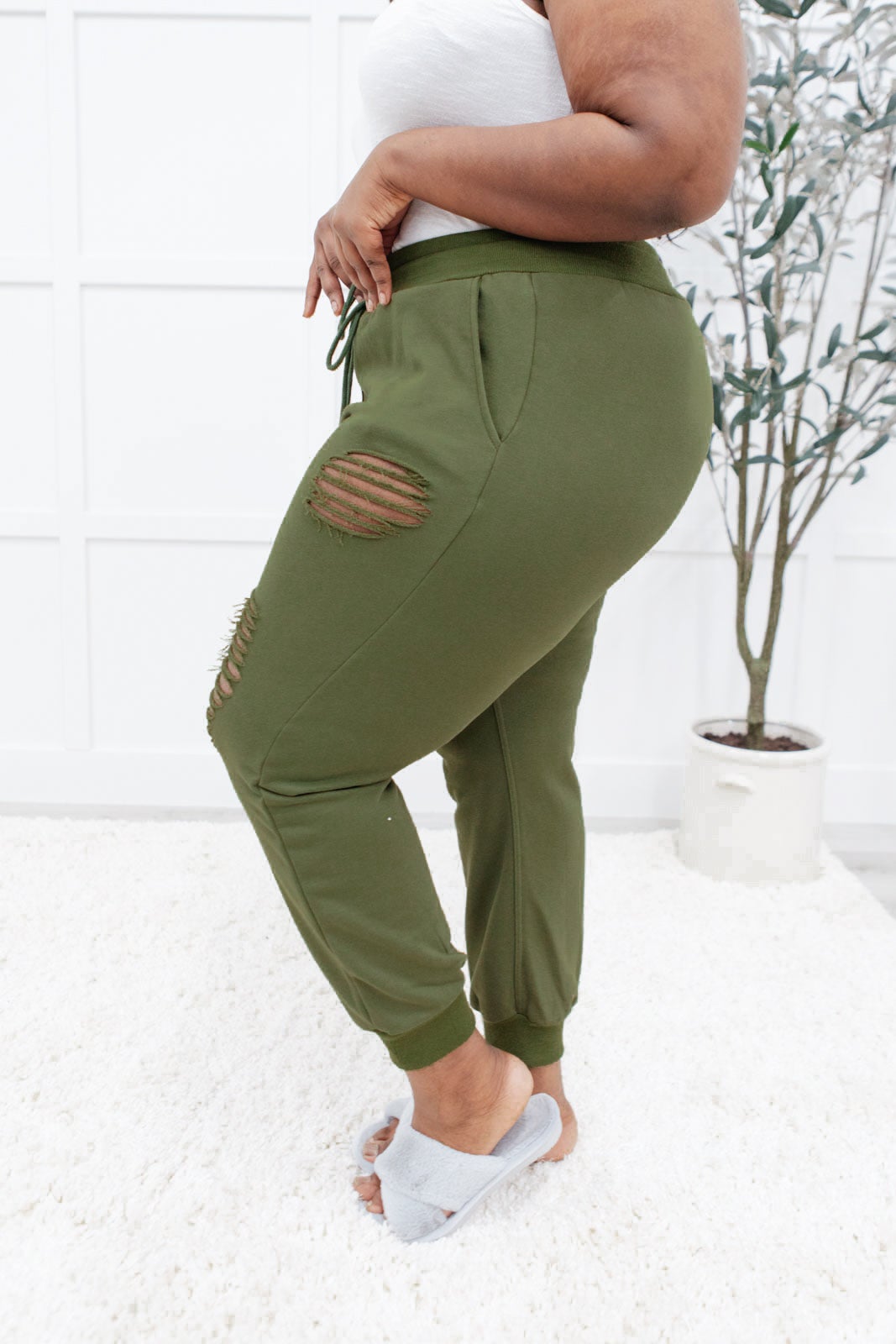 Kick Back Distressed Joggers In Olive